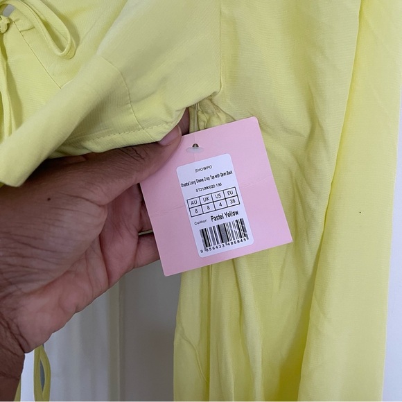 NWT Showpo. Shantal Balloon Sleeve Open back Crop Top in Pastel Yellow - Picture 7 of 9